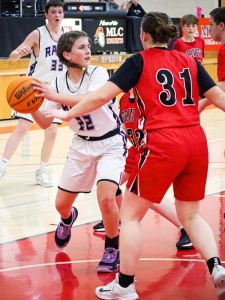 Girl passing the basketball