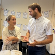 Principal Mitchell Giovannettone consulting with a teacher