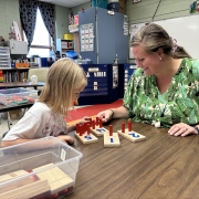 Keely Prekop with a student