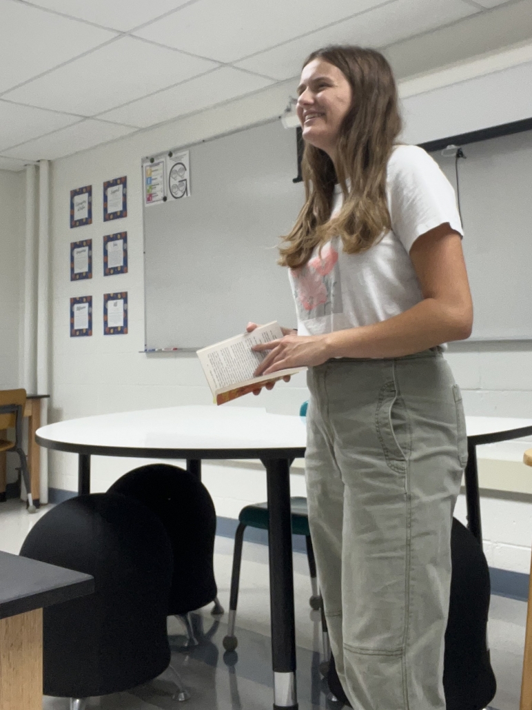 Kortney Behnke in front of classroom