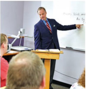 Dr. Lawrence Olson teaching