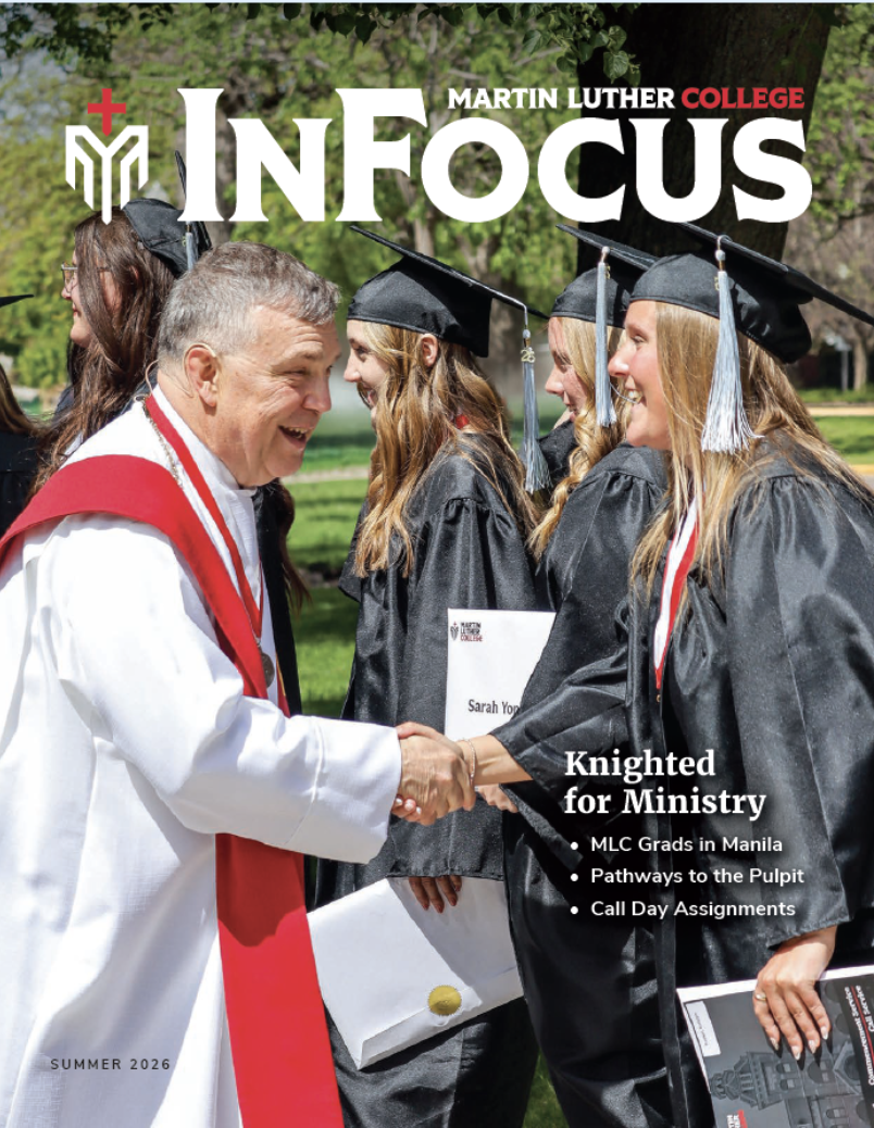 InFocus Magazine Cover-President Gurgel congratulating graduate