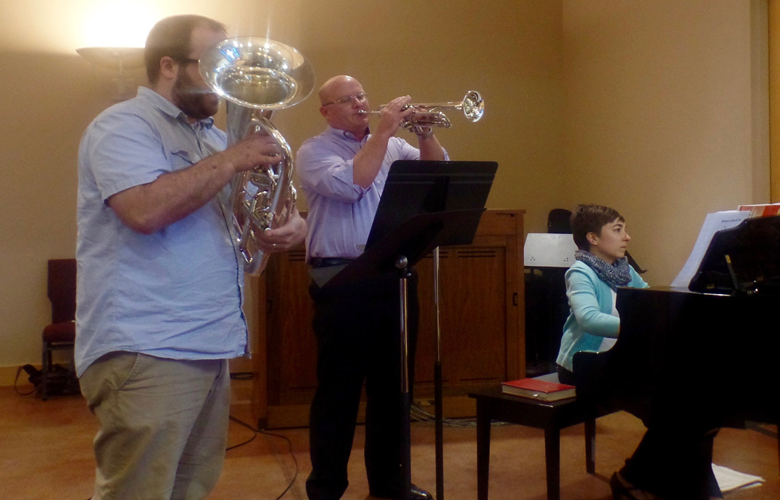 Here I am accompanying two volunteer musicians during the offering on Pentecost Sunday.